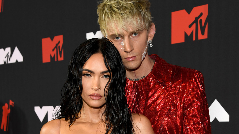 Megan Fox and Machine Gun Kelly posing