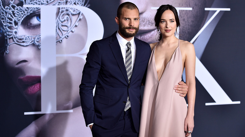 Dakota Johnson and Jamie Dornan smiling