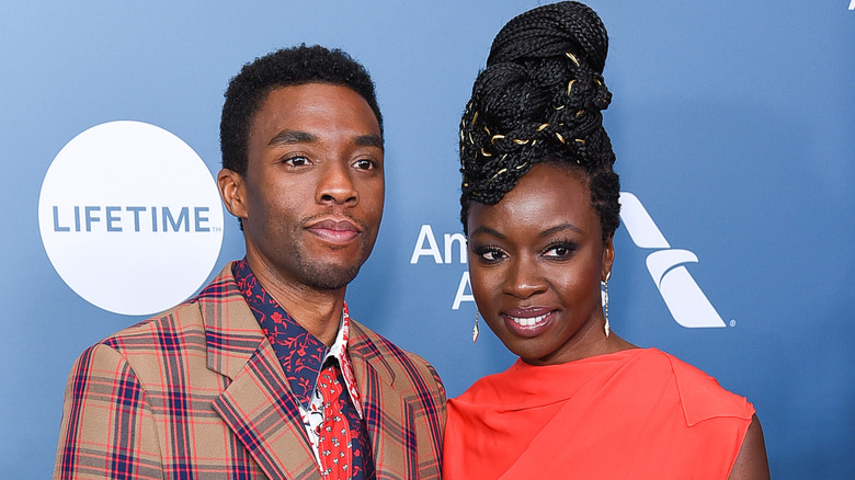 Chadwick Boseman and Danai Gurira posing