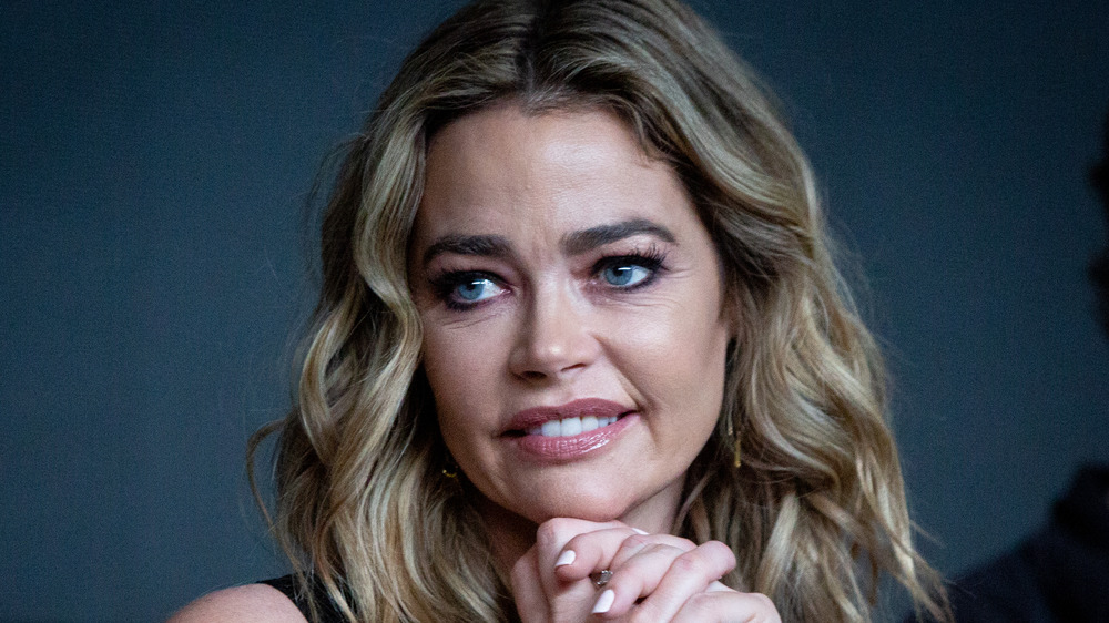 Denise Richards grimacing