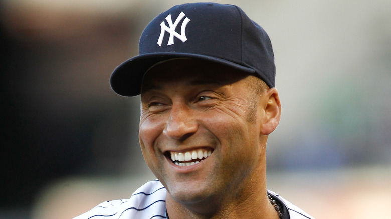 Derek Jeter wearing Yankees hat