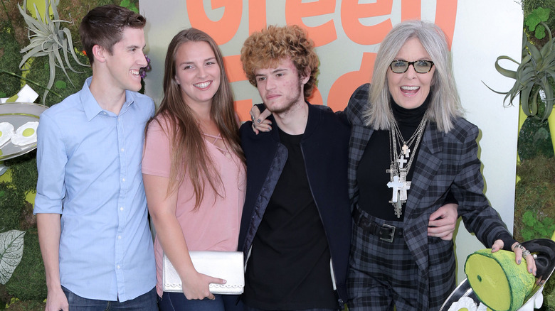 Diane Keaton posing with children