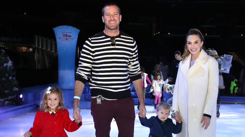 Armie Hammer, Elizabeth Chambers, and their children skating