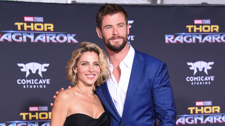 Chris Hemsworth and Elsa Pataky smile at an event