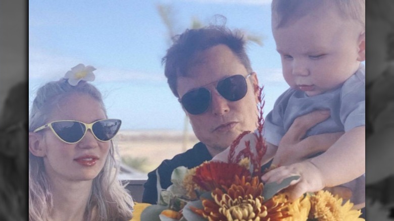 Elon Musk, Grimes and son X 