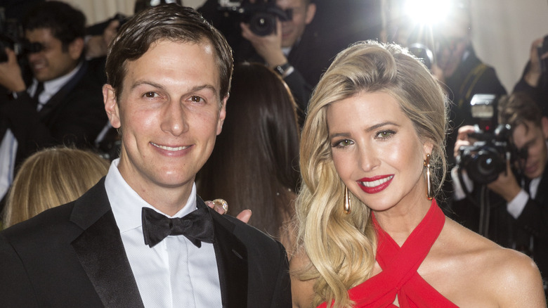 Jared Kushner posing with Ivanka Trump