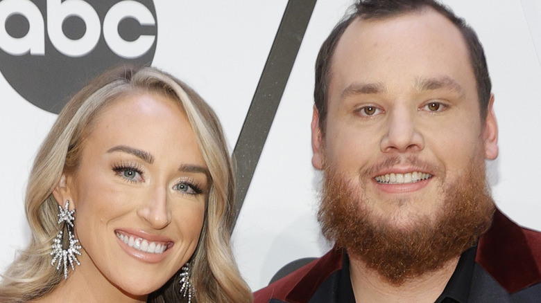 Nicole Hocking and Luke Combs smiling