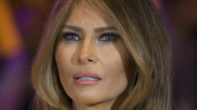 Melania Trump reacts at an event