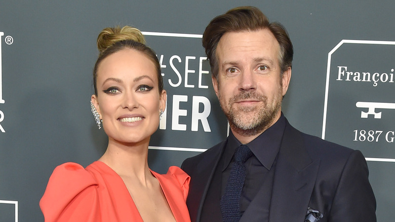 Olivia Wilde and Jason Sudeikis pose 