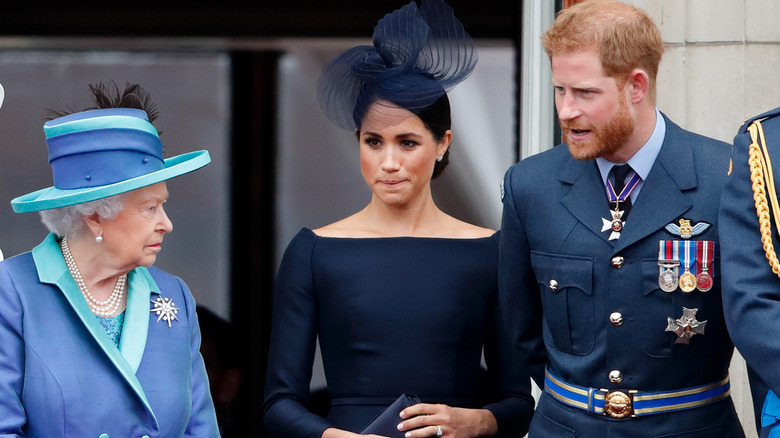 Queen Elizabeth, Meghan Markle, Prince Harry speaking