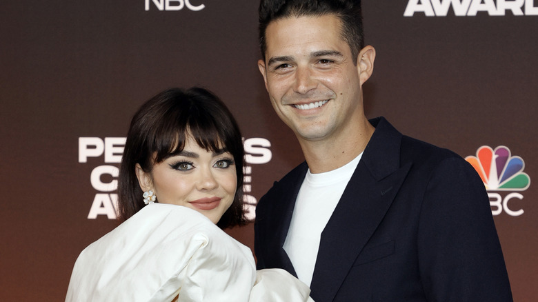 Sarah Hyland bat wing eyeliner holding Wells Adams smiling