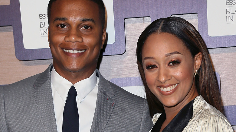 Cory Hardrict and Tia Mowry posing