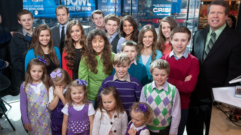 The Duggar family smiling