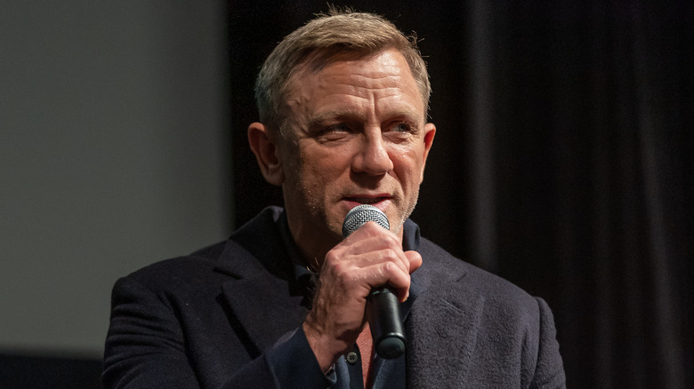 Daniel Craig speaks on a panel