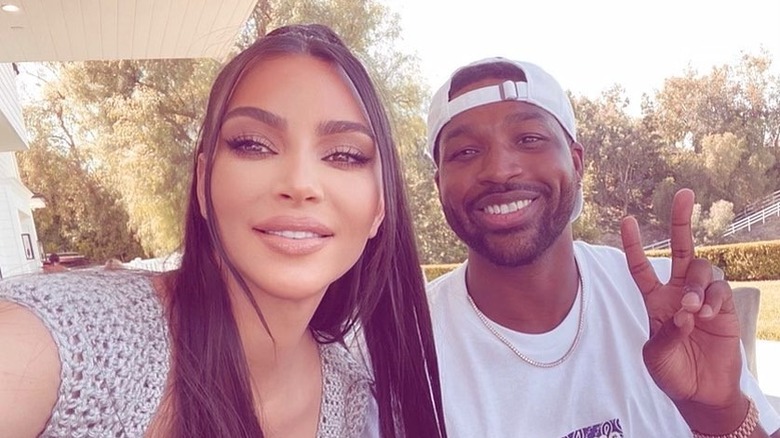 Kim Kardashian takes a selfie with Tristan Thompson.