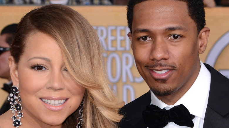 Mariah Carey and Nick Cannon on the red carpet for a show 