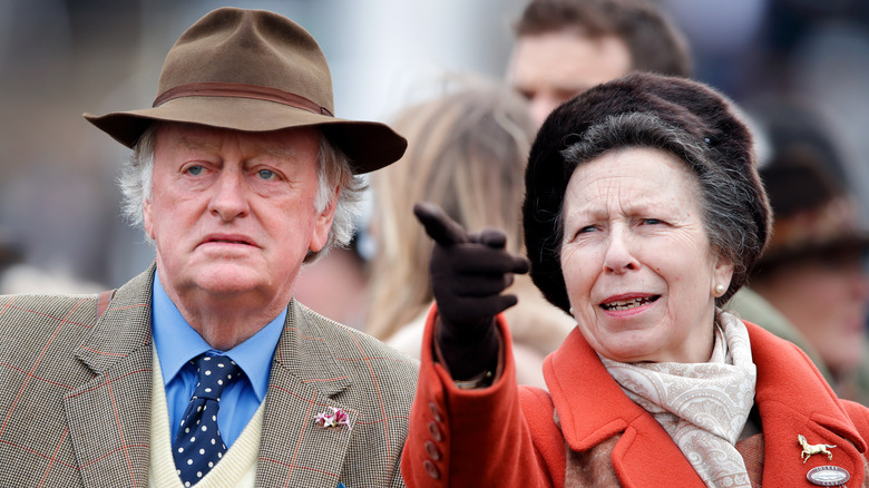 Andrew Parker Bowles and Princess Anne pointing