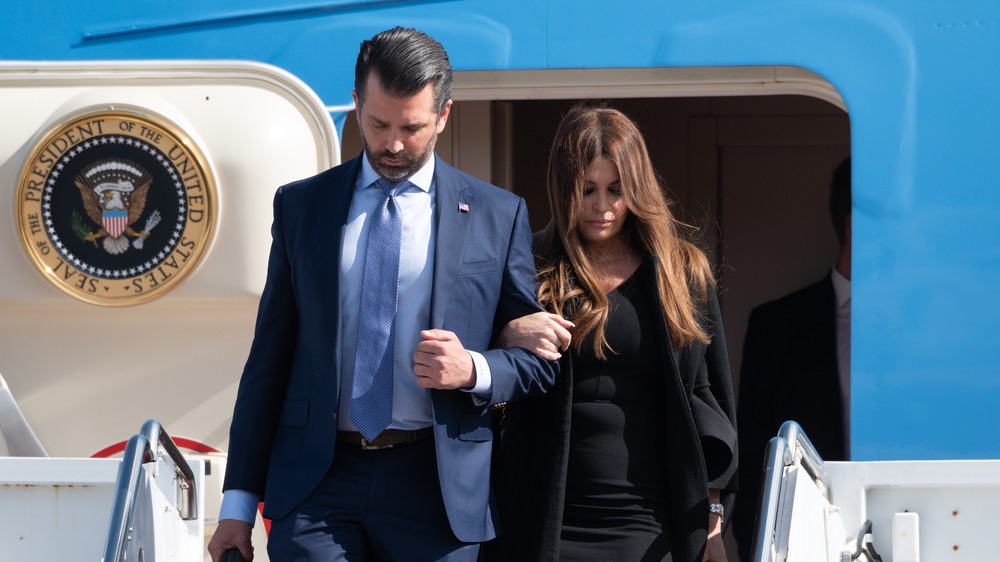 Donald Trump, Jr. and Kimberly Guilfoyle disembarking