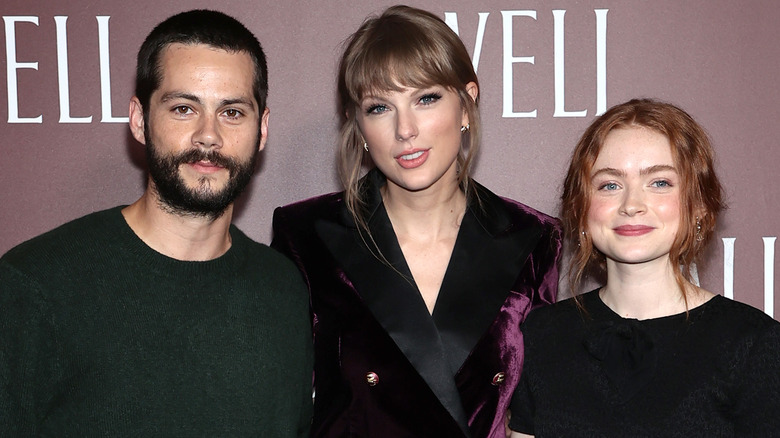 Dylan O'Brien, Taylor Swift, and Sadie Sinks smiling