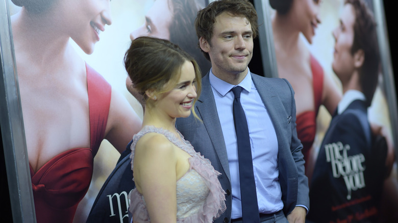 Sam Claflin and Emilia Clarke pose together