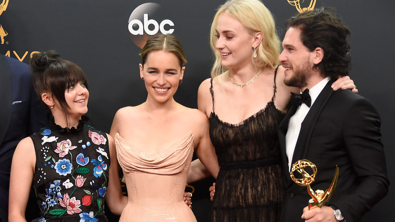 Sophie Turner and Emilia Clarke with co-stars Maisie Williams and Kit Harington