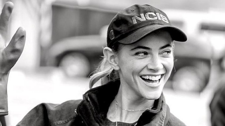 Emily Wickersham wearing NCIS cap