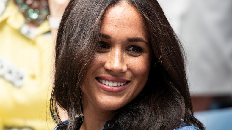 Meghan Markle at an event, smiling