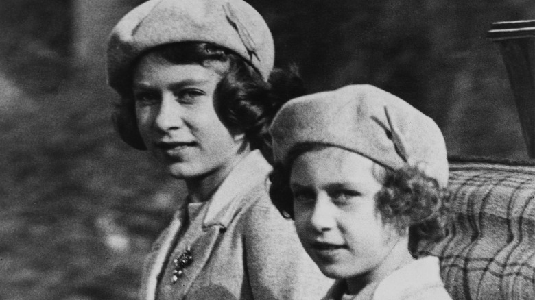 Princess Margaret and Queen Elizabeth II young, black and white, in carriage