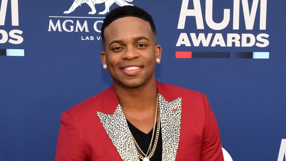 Jimmie Allen smiling