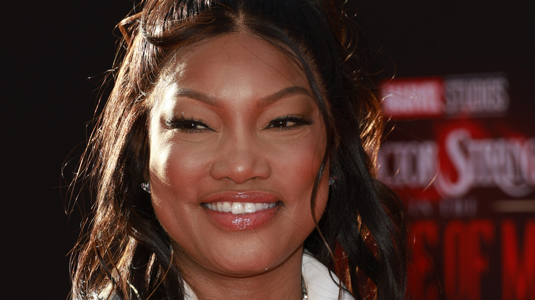 Garcelle Beauvais smiling on the red carpet 