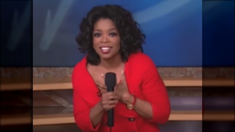 Oprah Winfrey holding microphone