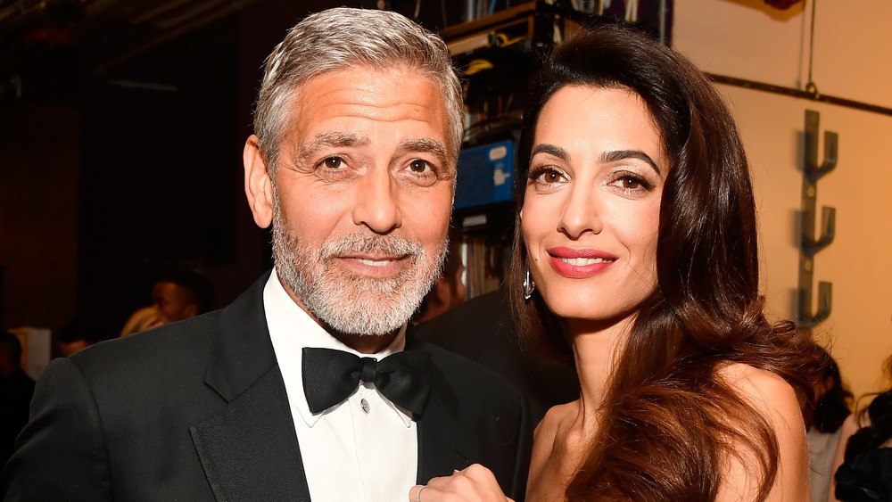 George and Amal Clooney smiling