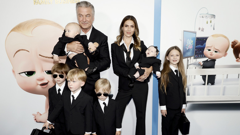 Alec Baldwin posing with wife, Hilaria, and six children