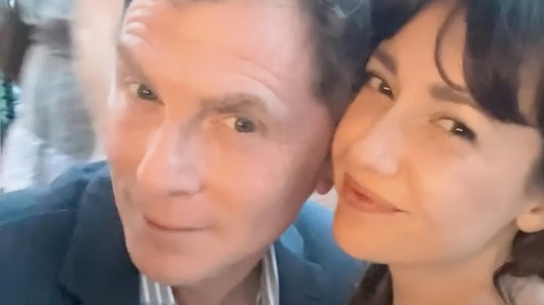 Bobby Flay and Christina Pérez posing