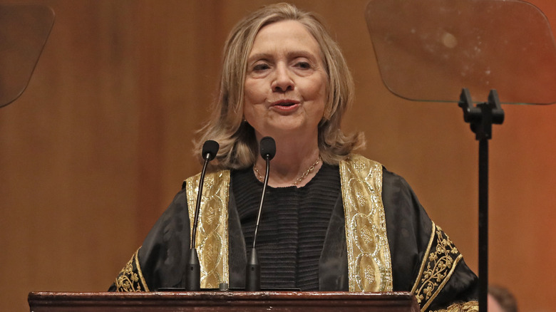 Hillary Clinton smiles at a rally