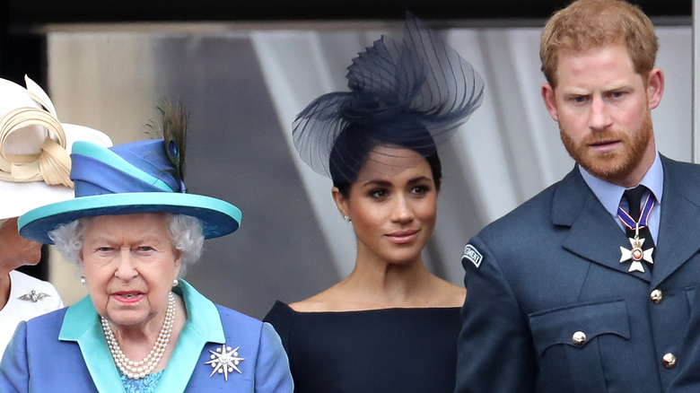 Queen Elizabeth with Meghan Markle and Prince Harry