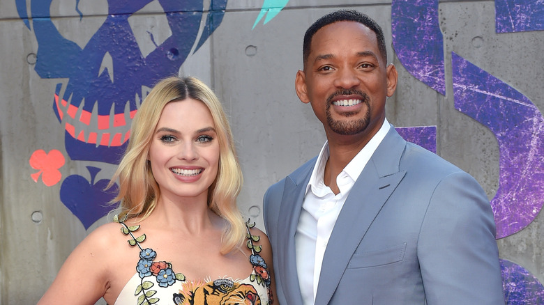 Margot Robbie and Will Smith posing