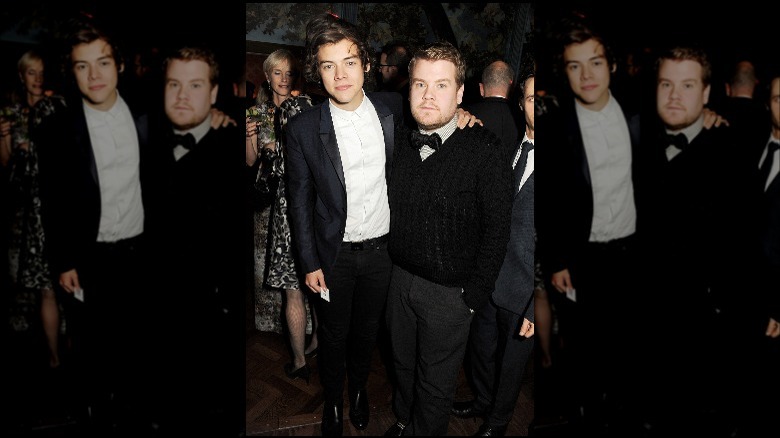 James Corden and Harry Styles wearing suits