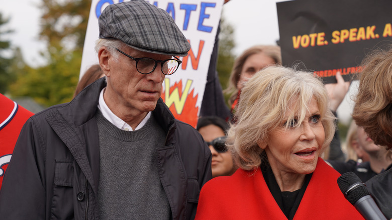 Ted Danson and Jane Fonda speak to a reporter shortly before their arrest