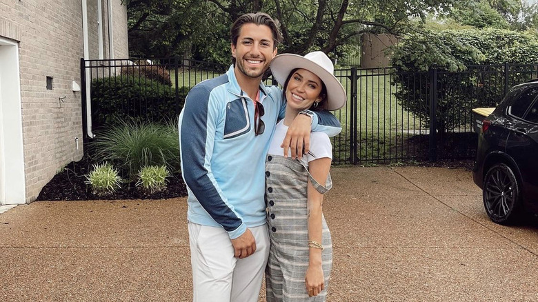 Jason Tartick and Kaitlyn Bristowe posing for photo together