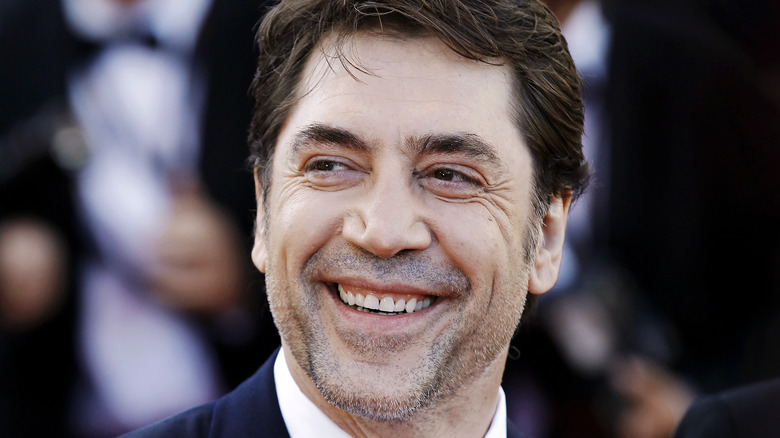 Javier Bardem smiling in suit