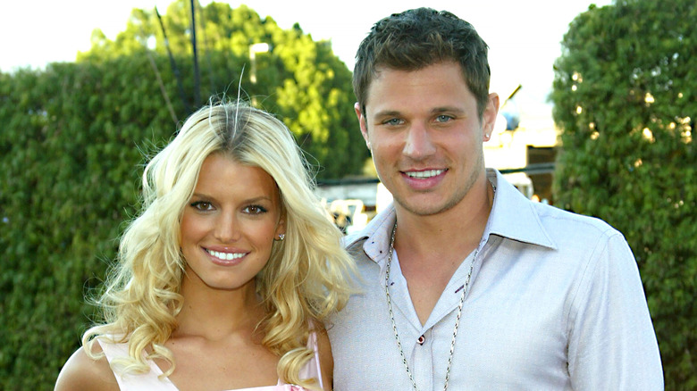 Jessica Simpson and Nick Lachey pose 