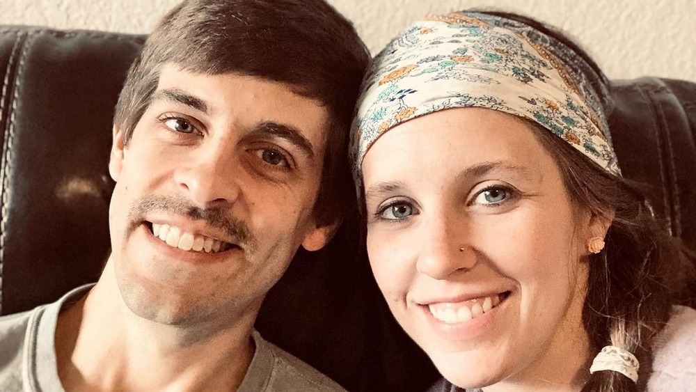 Derick Dillard and Jill Duggar couch