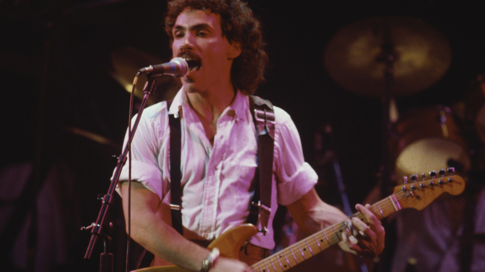 John Oates on stage singing in 1978