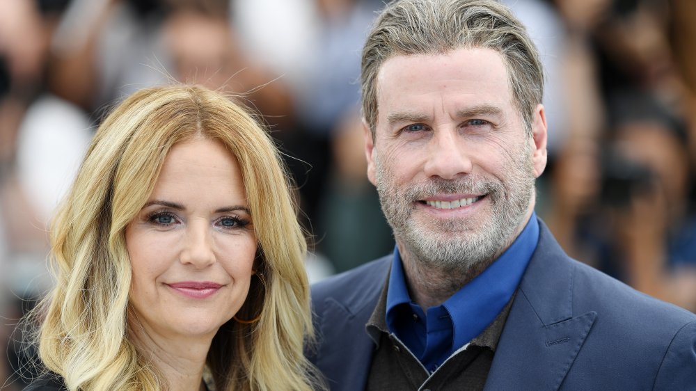 John Travolta and Kelly Preston attend the photocall for "Rendezvous With John Travolta - Gotti" during the 71st annual Cannes Film Festival at Palais des Festivals