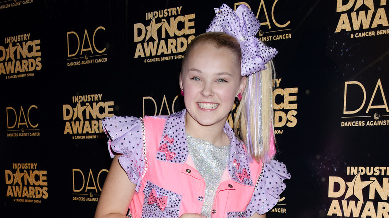 JoJo Siwa smiling on red carpet