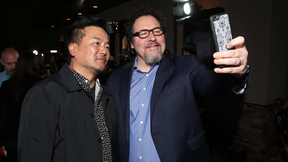 Roy Choi and Jon Favreau posing for a selfie