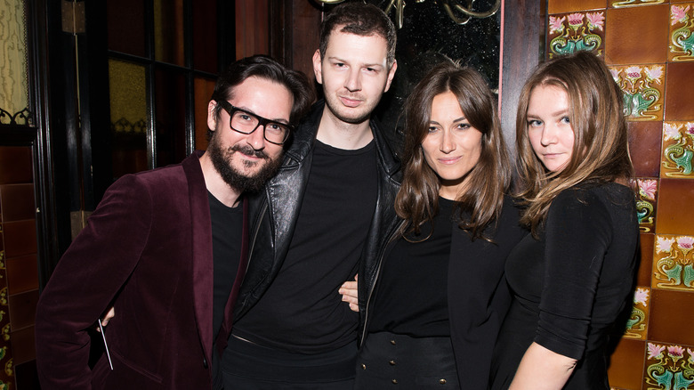 Anna Delvey and friends posing in 2014