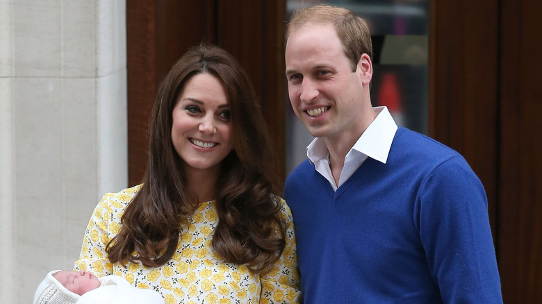 Kate Middleton and Prince William posing and smiling