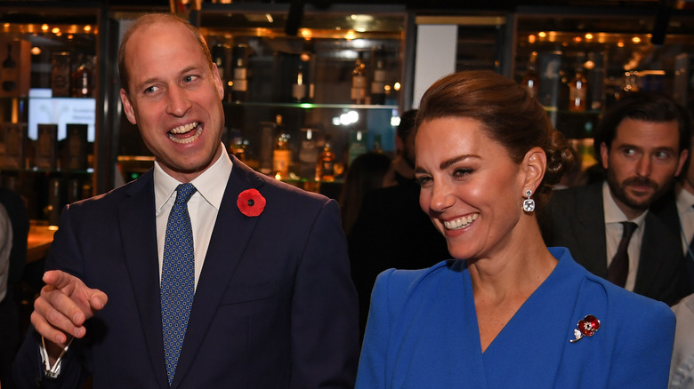 Kate Middleton and Prince William at an event, speaking